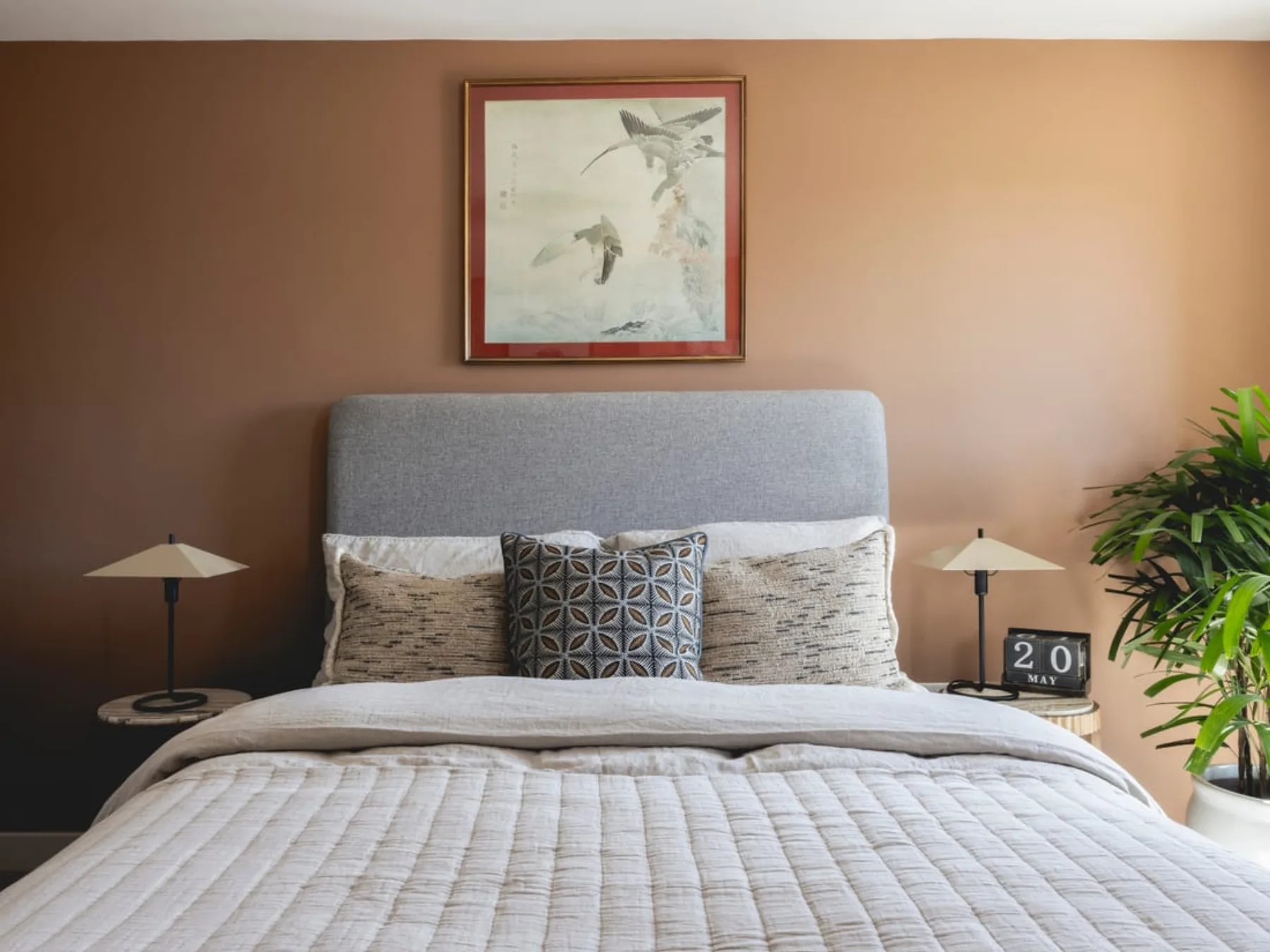 A king-size bedroom in a managed apartment